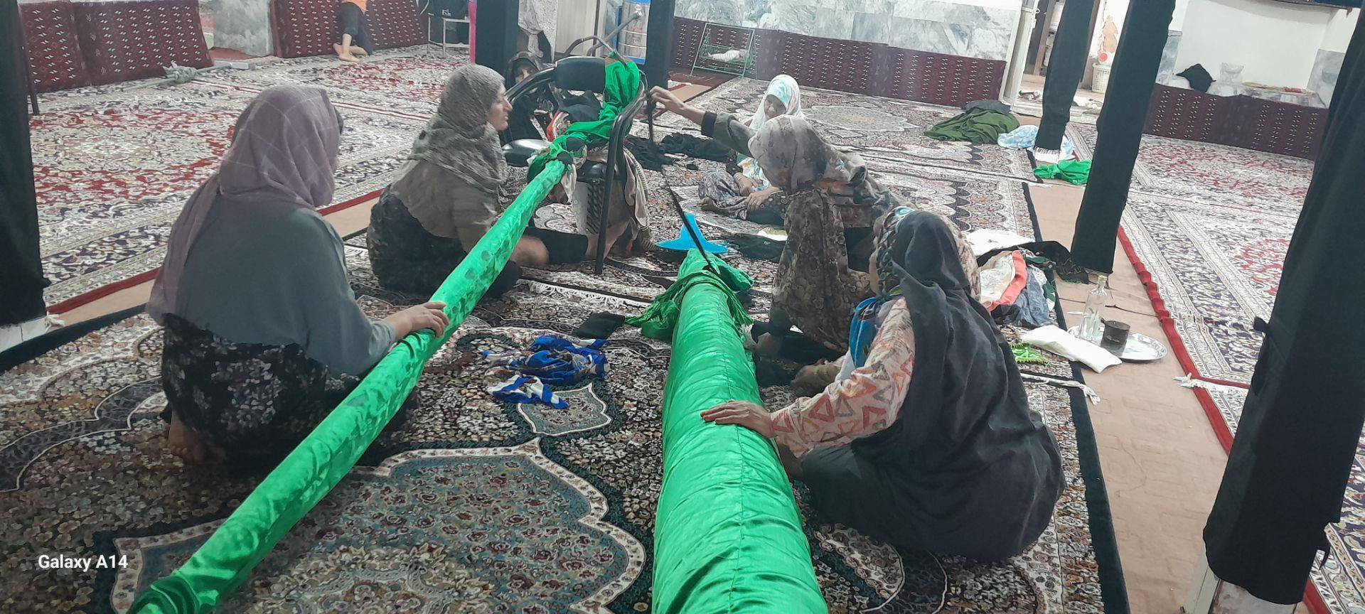 مراسم علم بندان بخش رخ تربت حیدریه با شرکت بانوان برگزار شد
