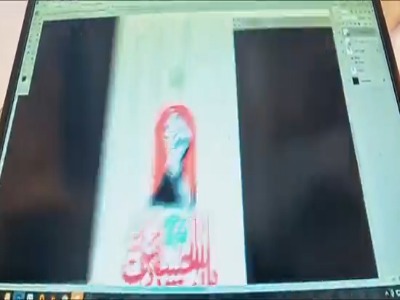 کتیبۀ جدید تصویر رهبر شهید در ایوان ساعت حرم امام رضا(ع) نصب شد